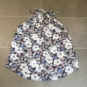 Ann Taylor black sleeveless floral top with white flowers